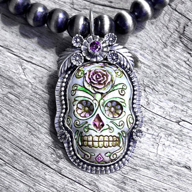 La Catrina Sugar Skull  Pendant Set In Sterling Silver with Purple Faceted Stone copyright chisholm trail designs 2025