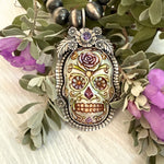La Catrina Sugar Skull  Pendant Set In Sterling Silver with Purple Faceted Stone copyright chisholm trail designs 2025