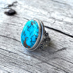 Royston Turquoise Ring Set in Sterling Silver with Flower Accents copyright chisholm trail designs 2025