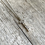 Tooled Leather Texture Sterling Silver Cross Necklace copyright chisholm trail designs 2025