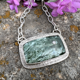 chisholmtraildesigns Argentium Silver Seraphinite Cabochon Necklace with inset Clear Faceted Zircon